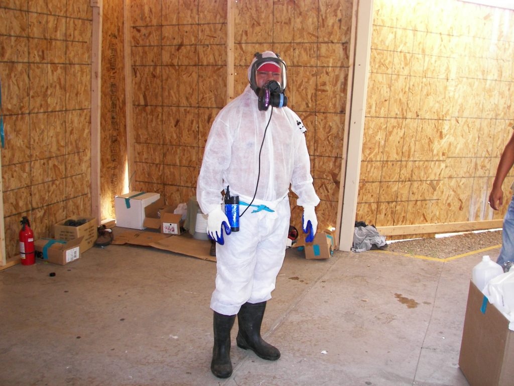 Asbestos Worker in full hazmat suit